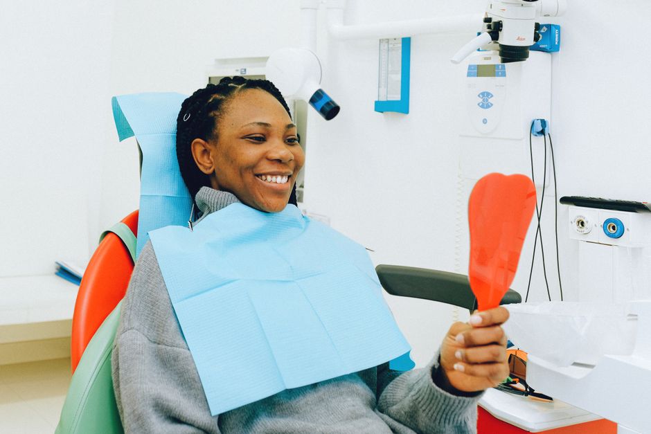 patient smiling during a dental check-up in Bakersfield