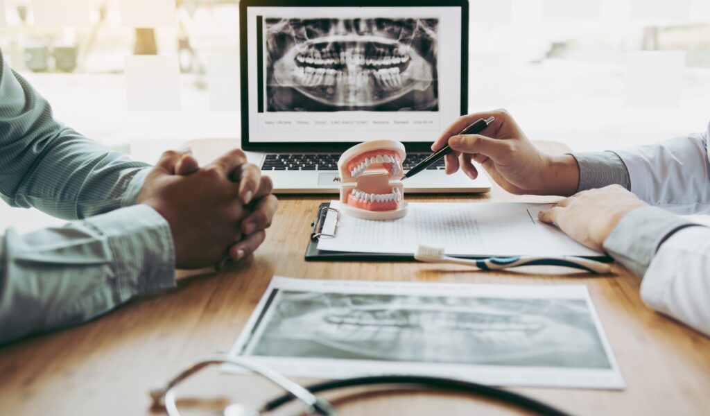 dental consultation of a man with orthodontists